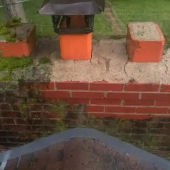 Brick chimney with a cap on top