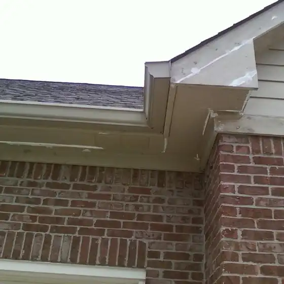 Painted fascia and gutter at a house corner